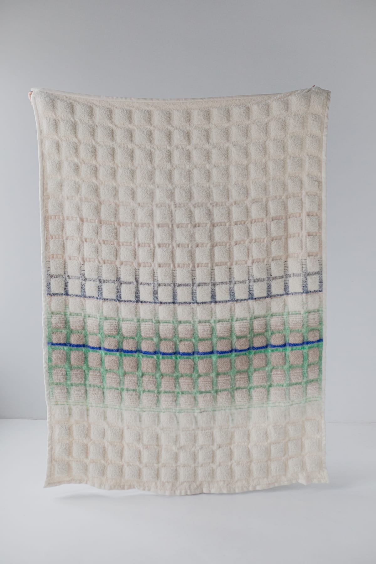 blue blanket in beige