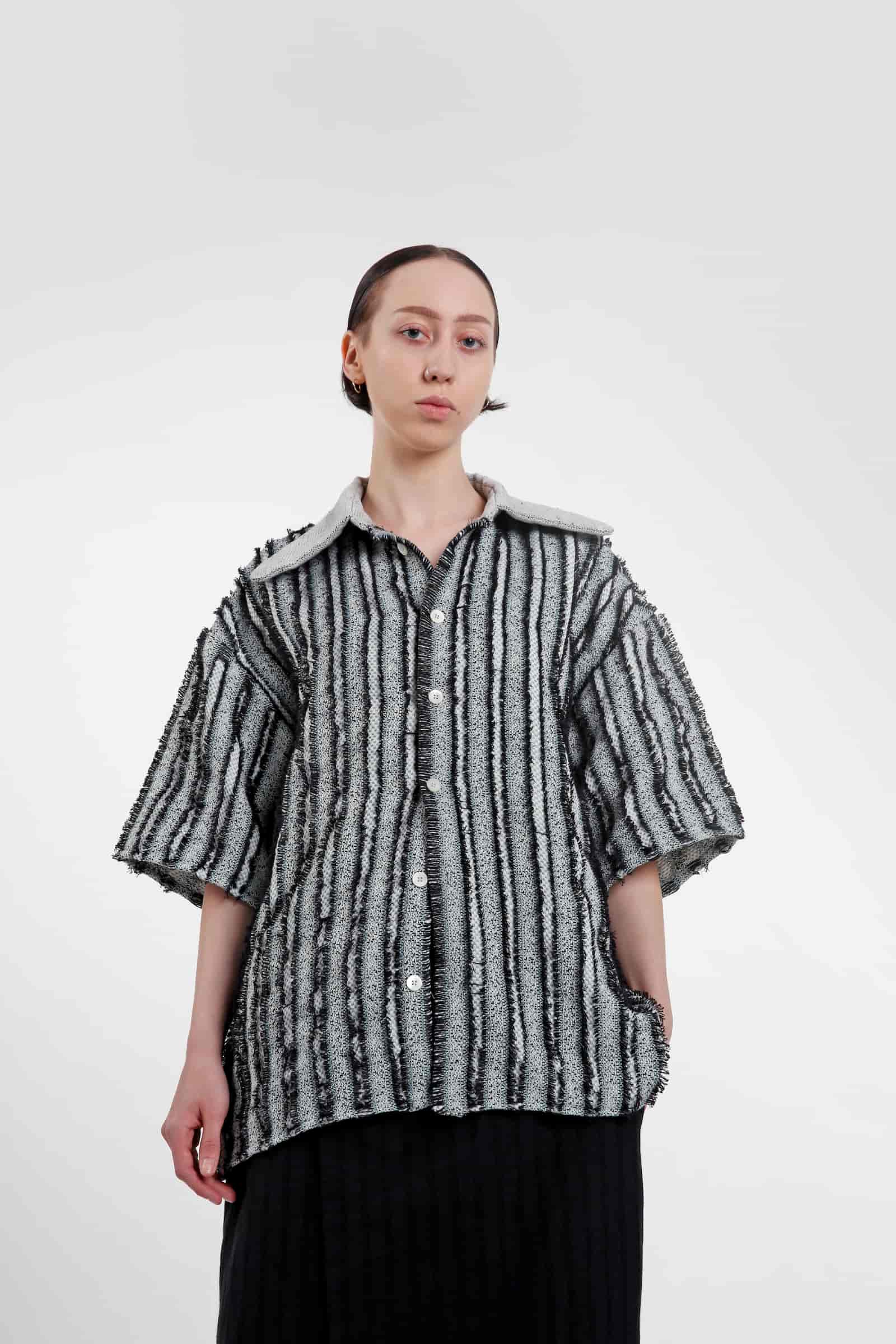 woman wearing shirt from the project on the white background